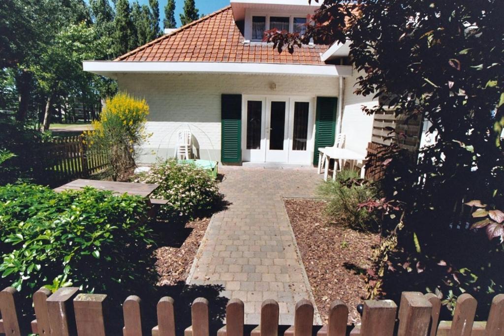 Appartement Dahlia Garden 8p De Haan Bagian luar foto