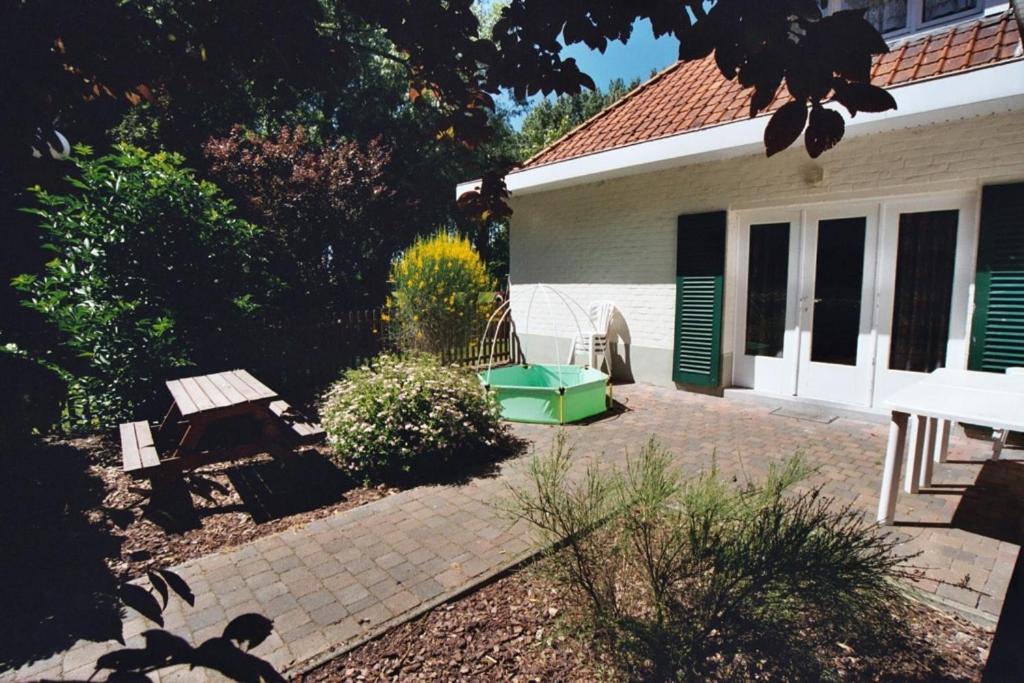 Appartement Dahlia Garden 8p De Haan Bagian luar foto